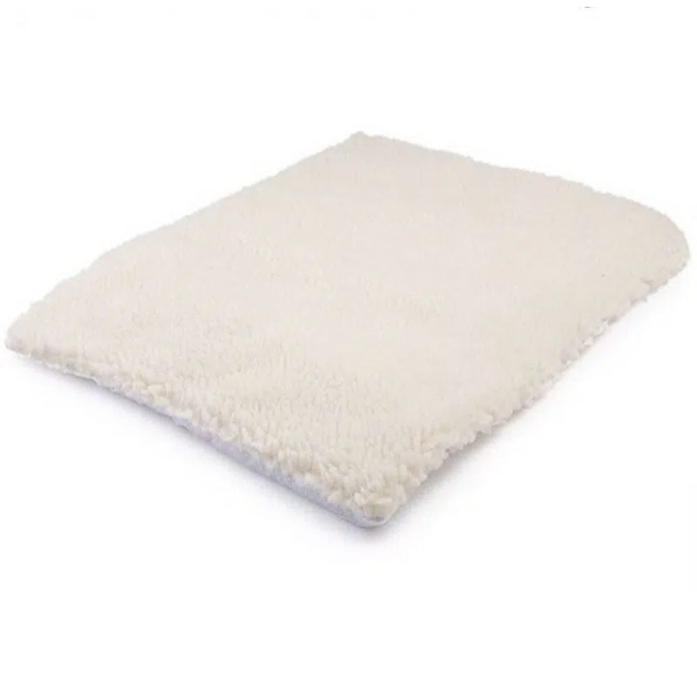 a close up of a mattress on a white surface